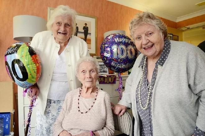 Dora Hornsby (centre) and former pupils Iris Gray (left) and Barbara Dodds (right), who were taught by Dora in 1939. Pictured as Dora celebrated her 100th birthday.