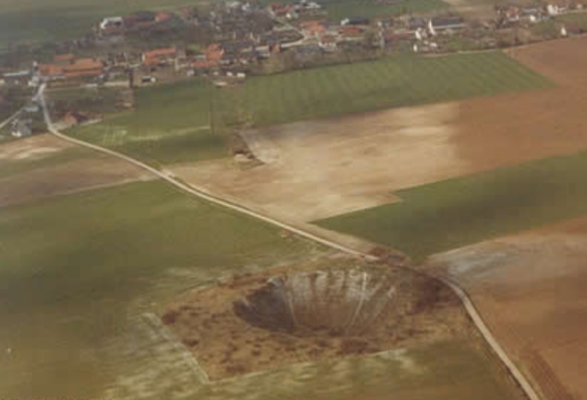 The Lochnagar Crater from the air taken in 1980.
