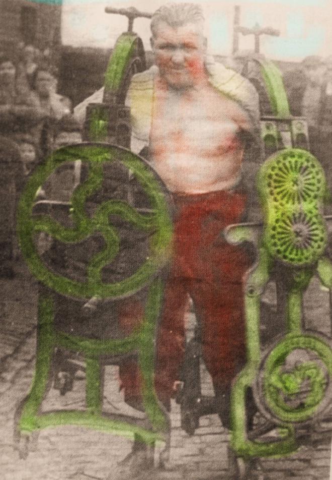 Samson Besford holding mangles
