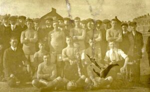 Photo of Jack Besford in a football team, either Radcliffe Excelsior or Seaton Hirst Celtic. Jack is in the middle of the back row.