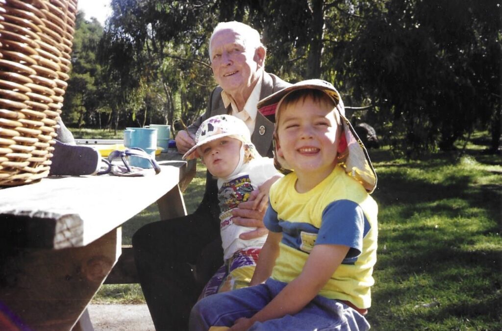 Tommy at Port Fairy, Victoria in 1991 with his great-grandsons Thomas (on his knee) and Joe